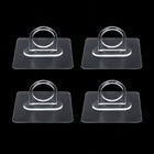 Adhesive plastic wall hook 4-piece set mounted on wall for home organisation