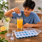 Close-up of flexible plastic ice cube tray with lid, showing durability