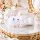 Cute baby headband with a floral bow in stretchable fabric