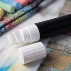 Erasable chalk marker on a whiteboard for daily notes