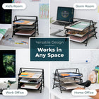 Three-tier metal storage rack placed on desk