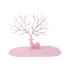Top view of pink deer jewelry stand with branches for accessories, India