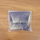 Coin pouch folded compactly, ready to carry