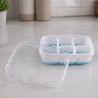 Side view of the mini plastic ice tray highlighting its space saving design.