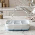 Easy release ice tray design for quickly dispensing frozen ice cubes.
