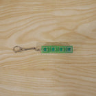 Small gadget key holder with tactile click and LED glow
