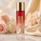Unisex Eau de Parfum spray with elegant red ombre bottle