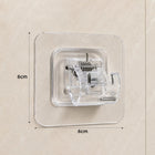 Size reference of transparent self-adhesive wall hook on white background