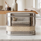 Side view of stainless steel modular oval canister in kitchen