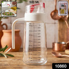 500ml glass oil dispenser with auto-flip cap and measuring markings, ideal for salad dressings and cooking oils