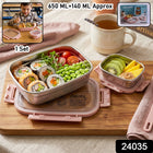 Open stainless steel kids lunch box showing compartments