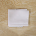 Round white table cover on a table for everyday use